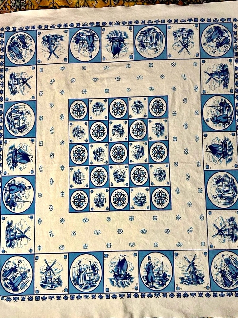 Vintage mid-20th-century souvenir tablecloth. Dutch scenes